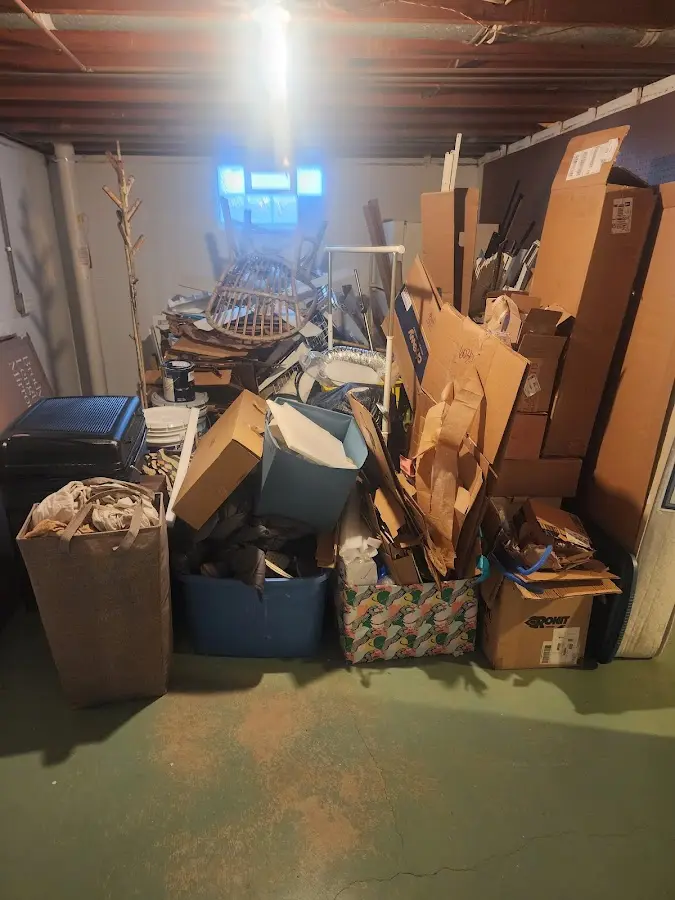 Roll-off dumpster container at job site for 2 Yard Dumpster Rental in Waterville